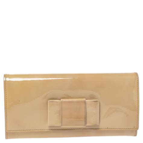 miu miu patent bow wallet|MIU MIU Beige Patent Leather Bow Continental Wallet.